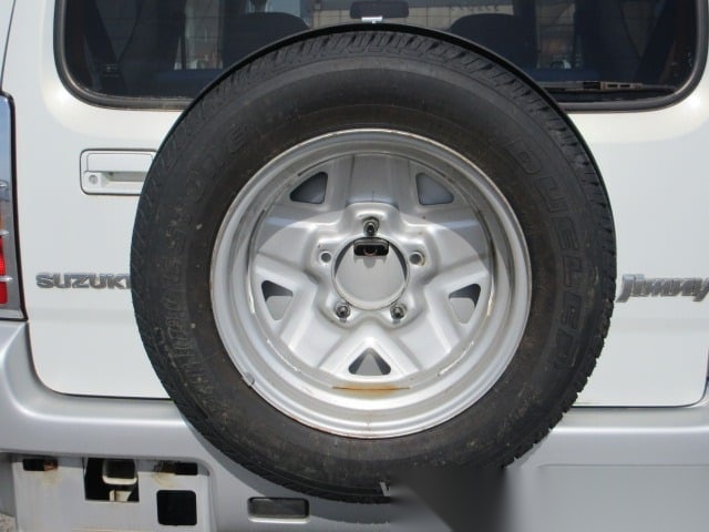 
								Go-Anywhere Pearl: 2001 Suzuki Jimny Auto 4WD full									