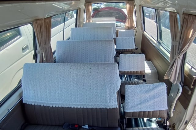 Homy Coach 2: rows of seats stacked down the long cabin